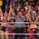 Ronda Rousey y Shayna Baszler Tag Team Champions